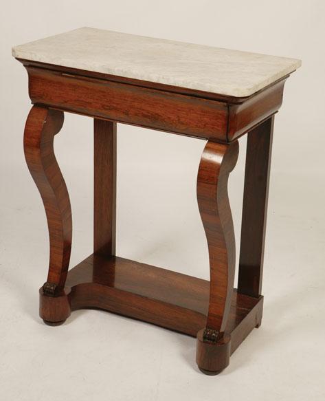 Appraisal: A VICTORIAN MARBLE TOP ROSEWOOD SIDE TABLE the rectangular top