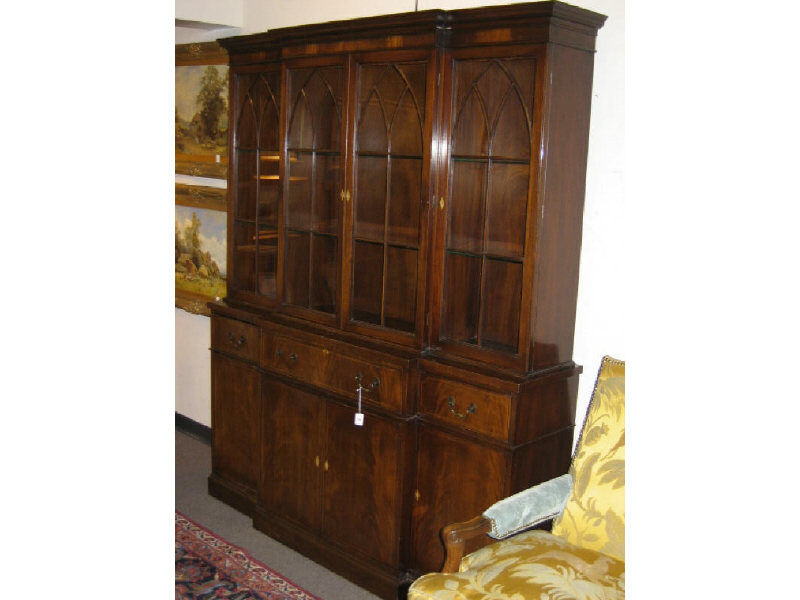 Appraisal: GEORGE III STYLE MAHOGANY BREAKFRONT Top unit with four glazed