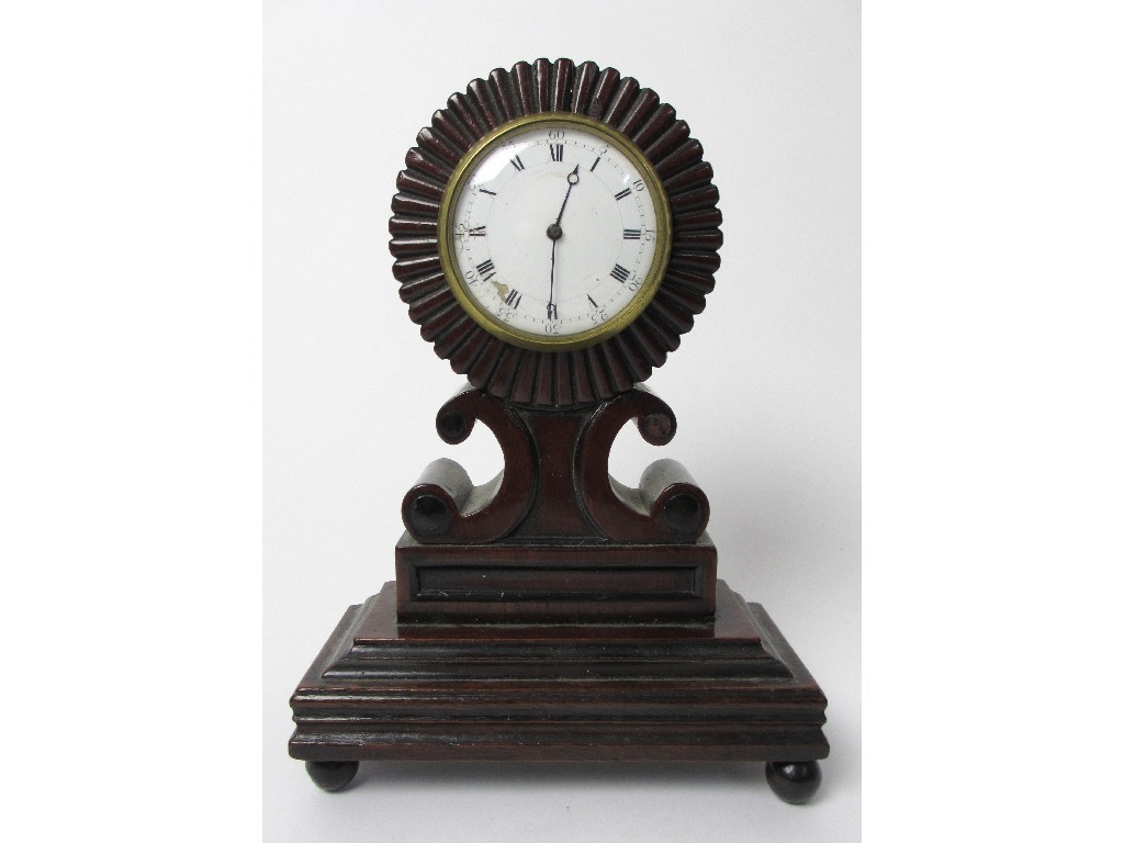 Appraisal: An early th century mahogany mantel clock with rosette shaped