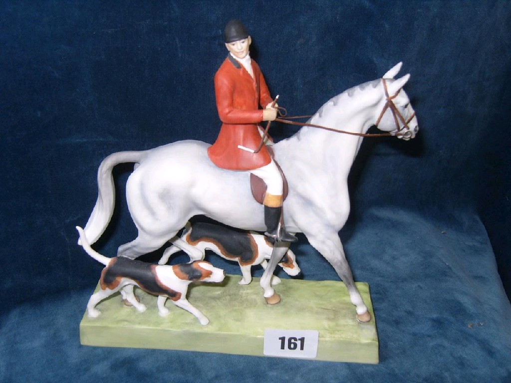 Appraisal: A Royal Worcester model of a huntsman and hounds by