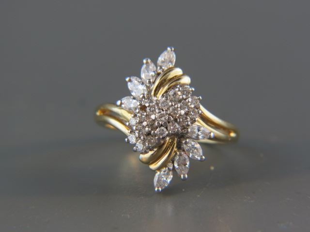 Appraisal: Diamond Ring diamonds round and baquette totaling carat k yellow