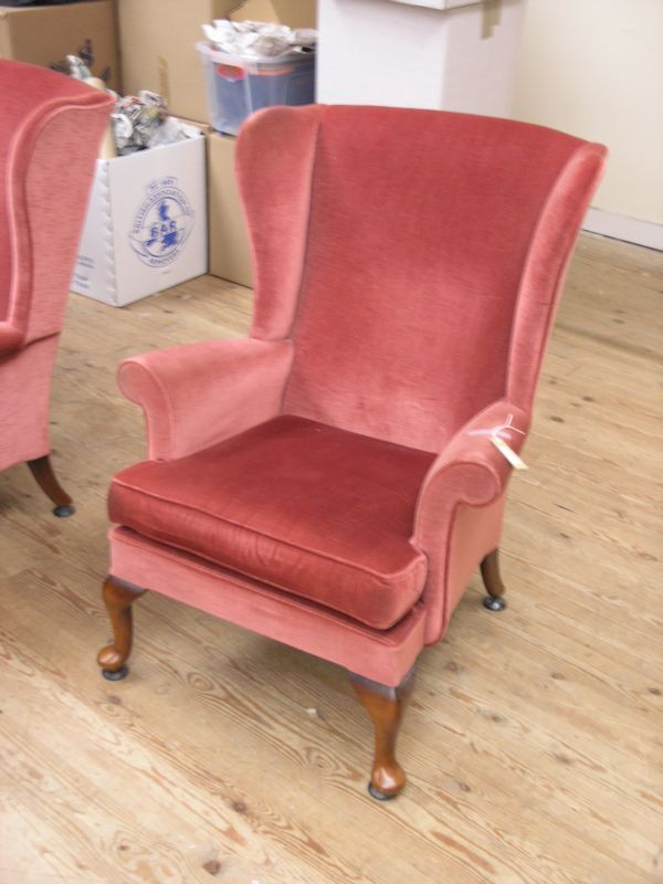 Appraisal: A Parker Knoll wing armchair upholstered in a pink dralon