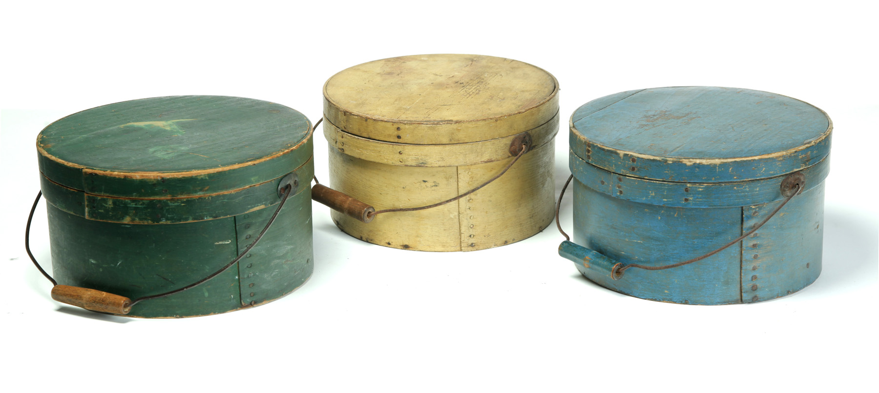 Appraisal: THREE AMERICAN CARRIERS Second half- th century Round bentwood carriers