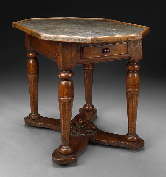 Appraisal: An Italian Baroque walnut table th century The rectangular top