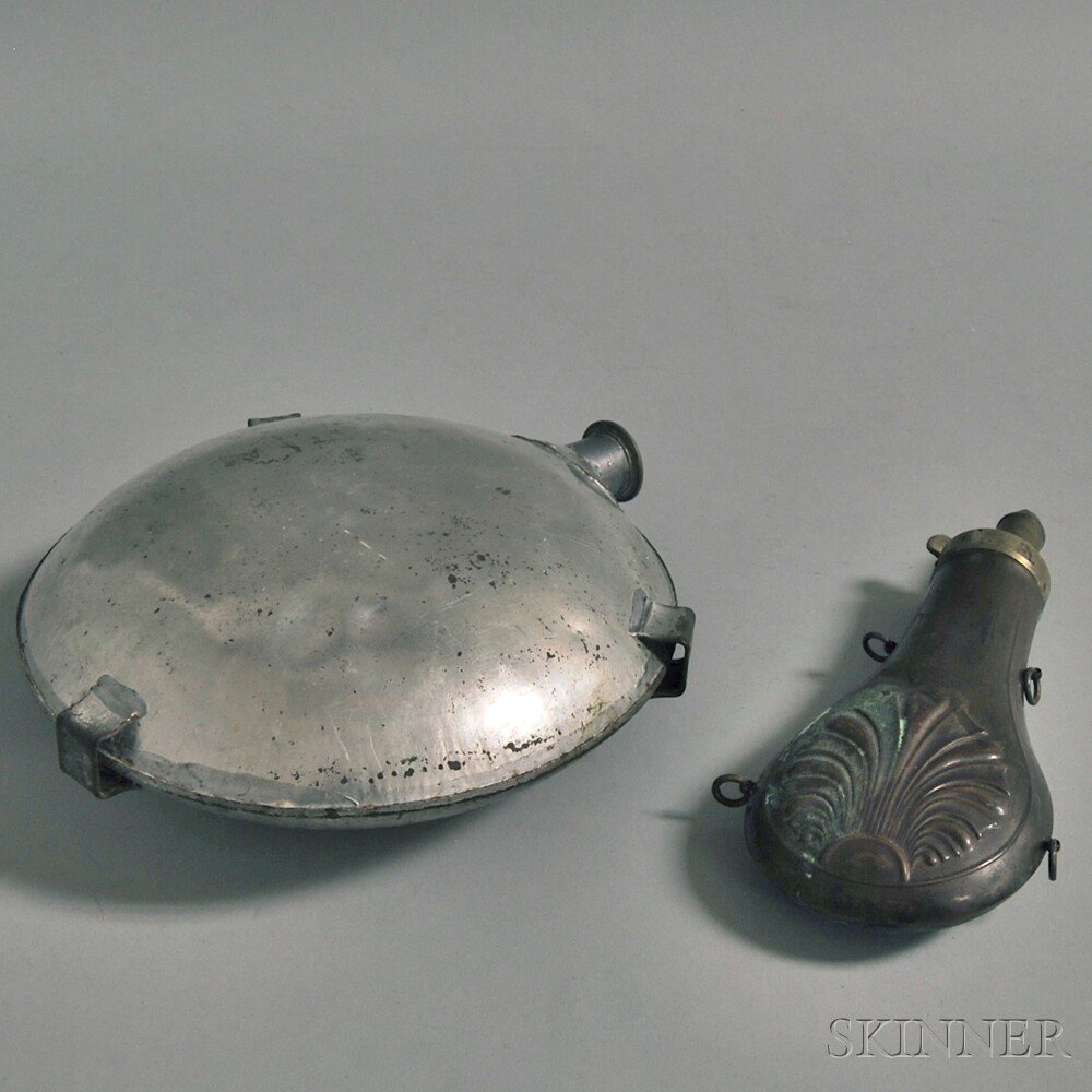 Appraisal: Two Military Accessories a pressed copper powder flask and a