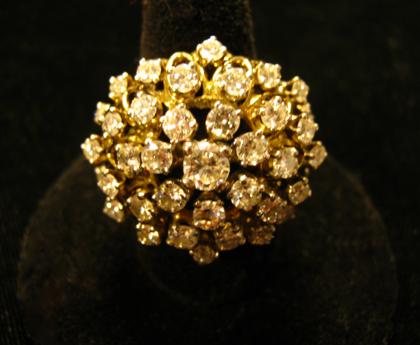 Appraisal: karat yellow gold and diamond cluster ringThirty-nine round cut diamonds