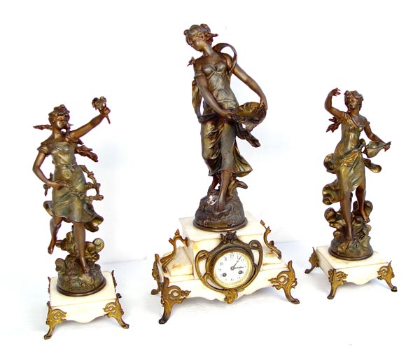 Appraisal: FRENCH MOUGIN FIGURAL CLOCK GARNITURE SET Turn of the century