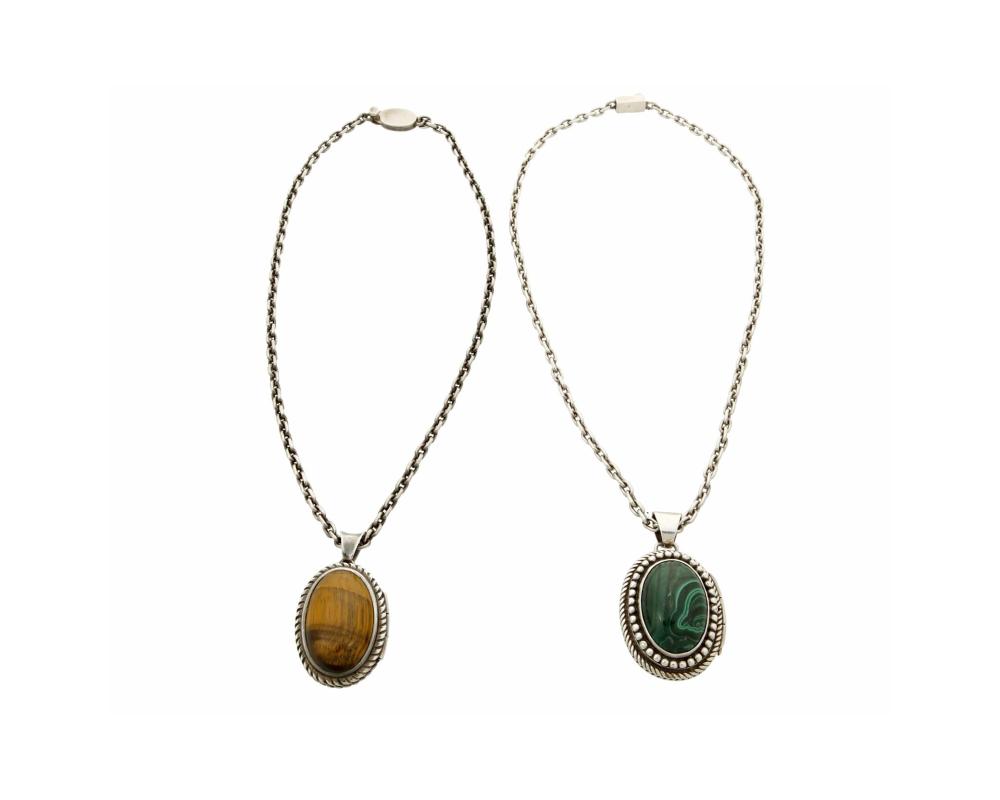 Appraisal: Two Antonio Pineda silver and hardstone pillbox pendants Antonio Pineda