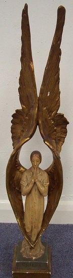 Appraisal: A plaster figure of an angel with raised wings and