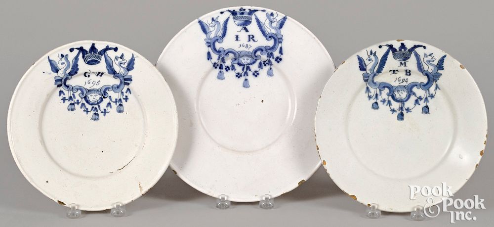 Appraisal: Three Delft armorial marriage plates th c Three Delft armorial