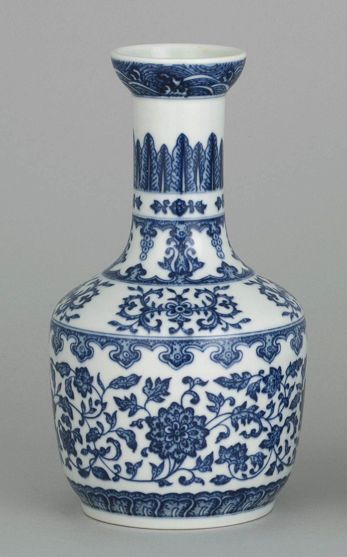 Appraisal: BLUE AND WHITE PORCELAIN BOTTLE VASE In mallet form with