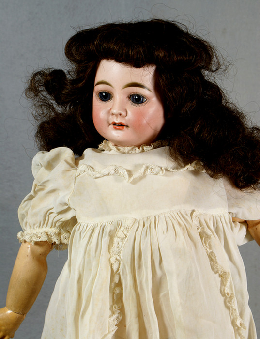 Appraisal: French bisque head doll set eyes impressed on back of