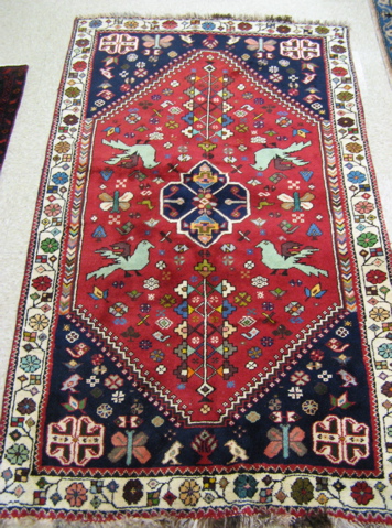 Appraisal: TWO PERSIAN TRIBAL AREA RUGS both hand knotted wool and