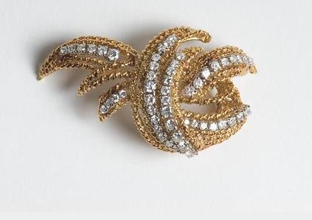 Appraisal: GOLD AND DIAMOND SPRAY BROOCH Set with fifty-three diamonds of