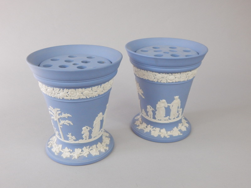 Appraisal: A pair of Wedgwood blue Jasperware posy vases each with