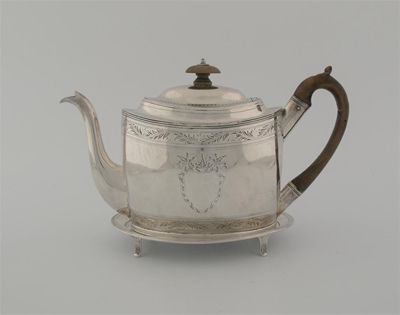 Appraisal: A George III engraved teapot with reed borders a domed