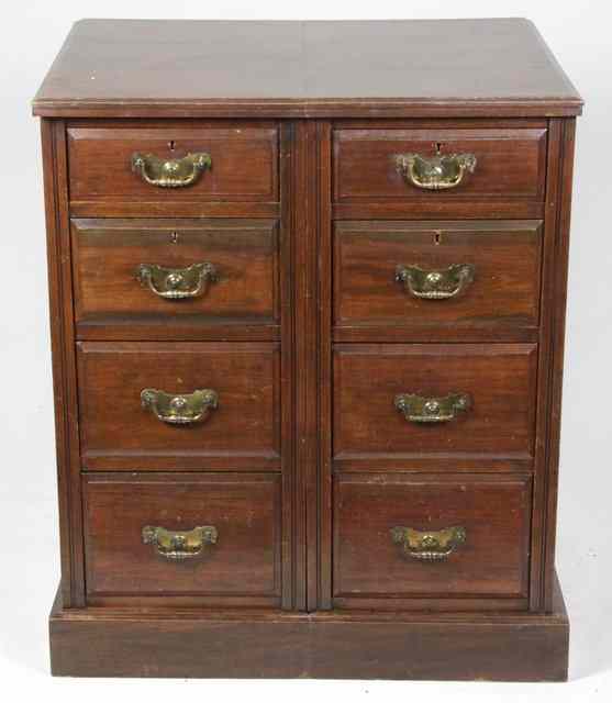 Appraisal: An Edwardian walnut twin pedestal chest cm wide