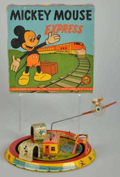 Appraisal: Tin Litho Marx Disney Mickey Express Wind-Up Toy Description American