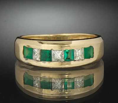 Appraisal: A Ladies' Emerald and Diamond Band k yellow gold diamond