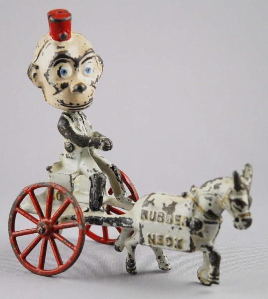 Appraisal: Cast Iron Happy Hooligan Mule-Drawn Nodder Toy Description Embossed Rubber