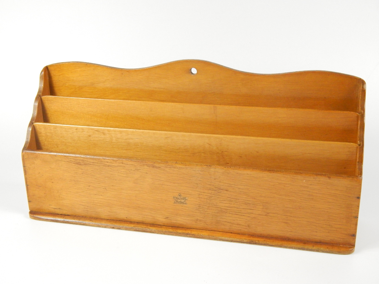 Appraisal: A Winel light oak stationery rack of stepped three section