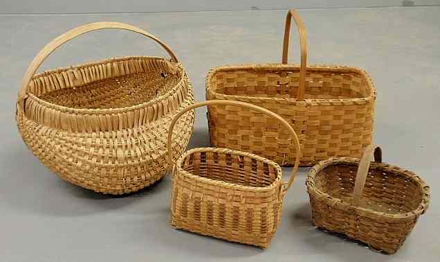 Appraisal: Large splintwood buttocks basket h and three other baskets