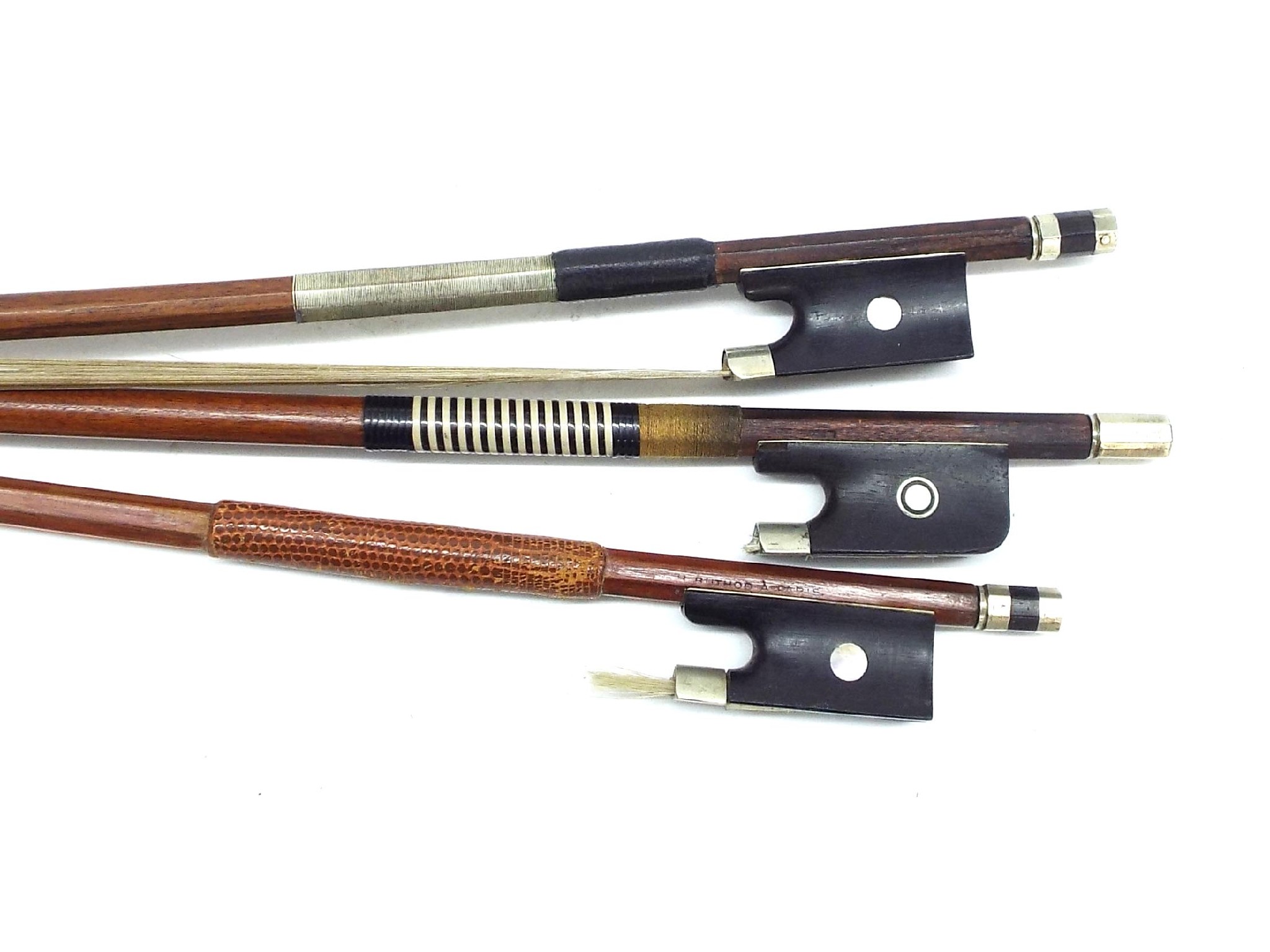 Appraisal: Silver mounted violin bow stamped Charles Brugere gm also two