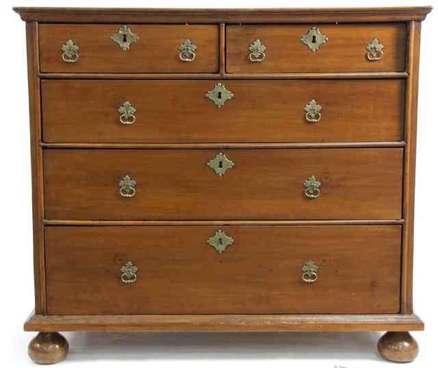 Appraisal: A fruitwood chest of th Century design fitted three long