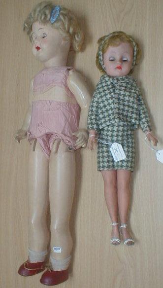 Appraisal: A Chiltern rubber headed doll with a blond wig sleeping