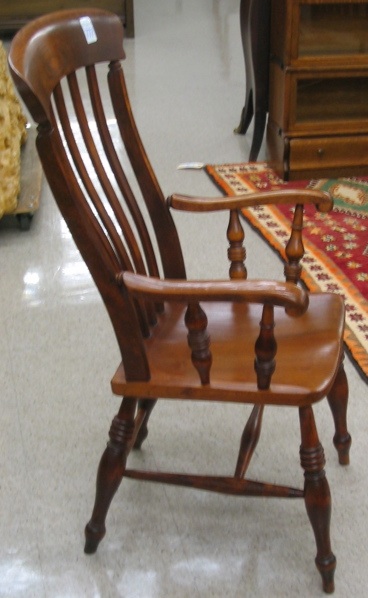 Appraisal: VICTORIAN LATH-BACK ARMCHAIR English mid th century of elm construction