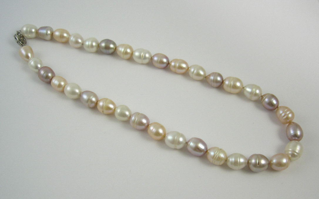 Appraisal: CHOKER LENGTH BAROQUE PEARL NECKLACE multi color necklace with pink