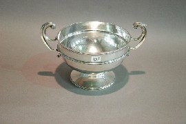 Appraisal: An Edwardian twin-handled sterling silver rose bowl of classic form