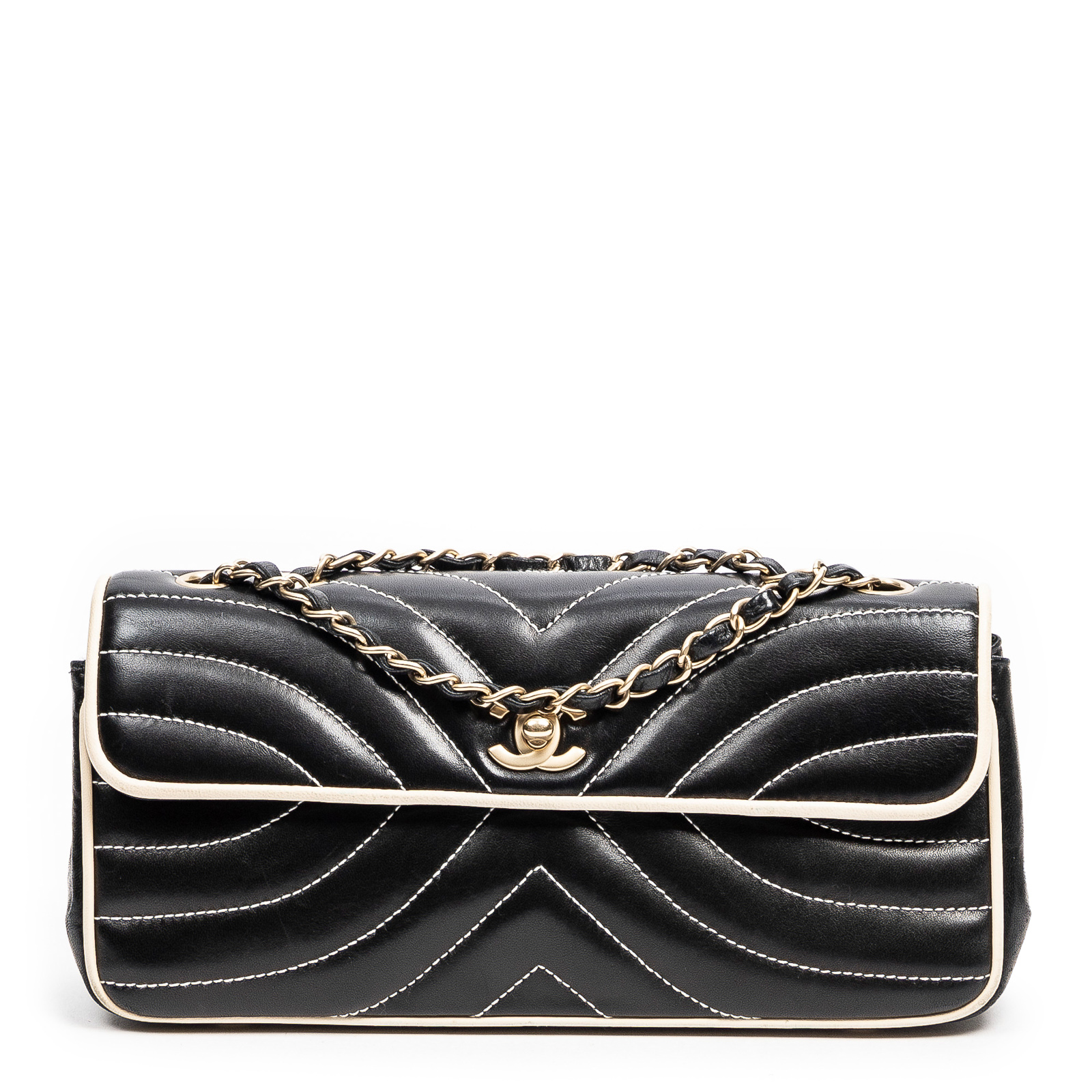 Appraisal: A CHANEL E W WAVE STITCH FLAP BAG A black