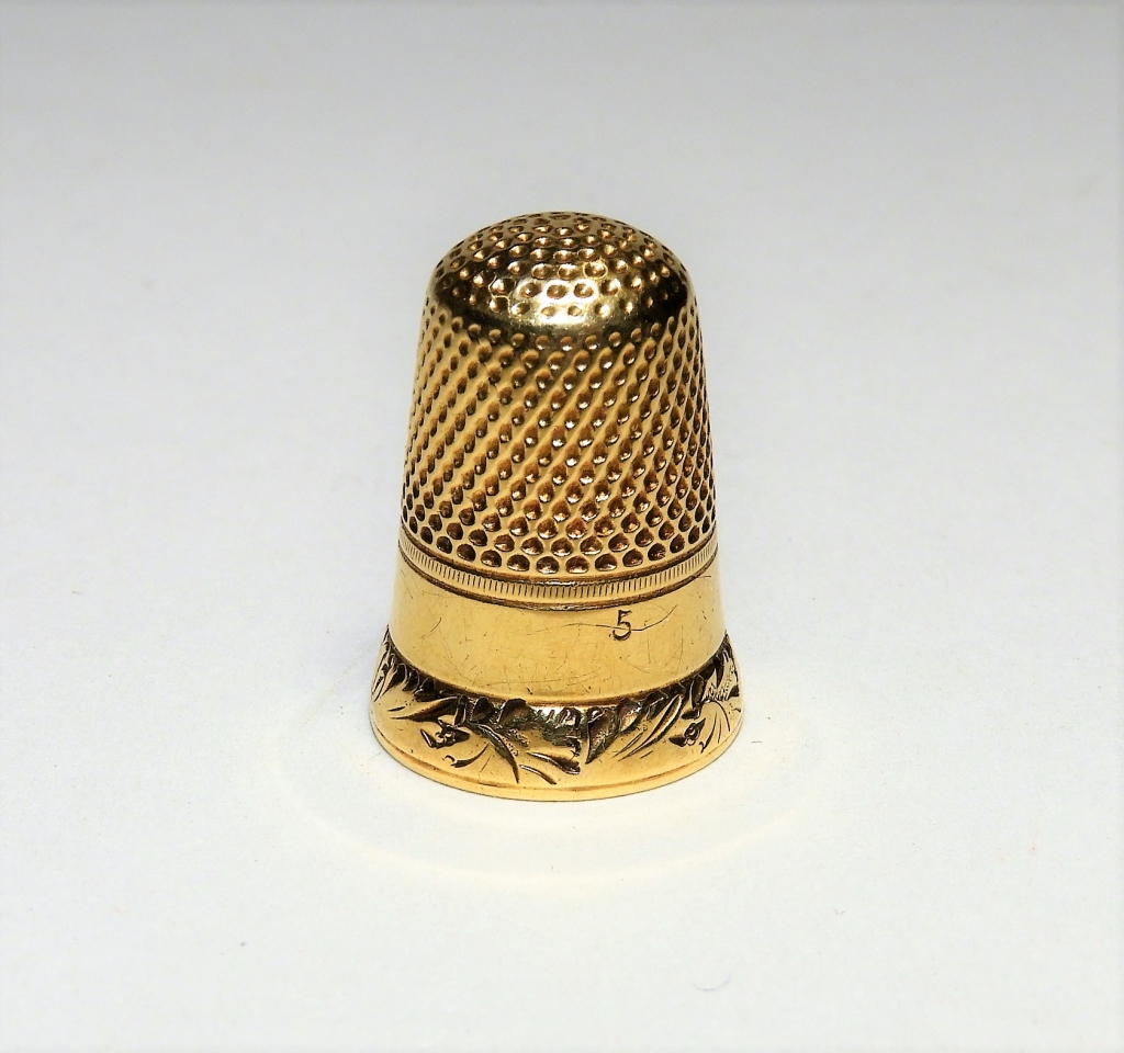 Appraisal: KT YELLOW GOLD SEWING THIMBLE Unknown C Stippled and floral