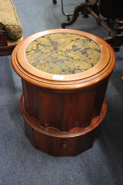 Appraisal: A VICTORIAN WALNUT COMMODE with fluted sides and lifting cylindrical