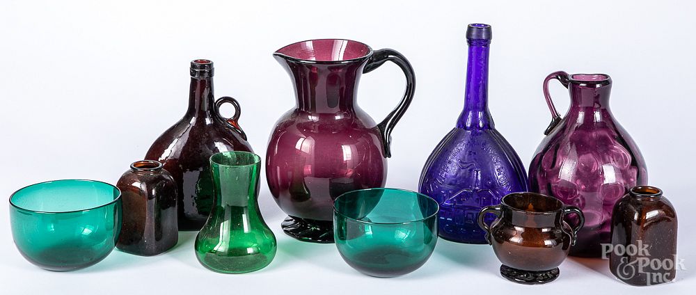 Appraisal: Group of colored glass Group of colored glass tallest -