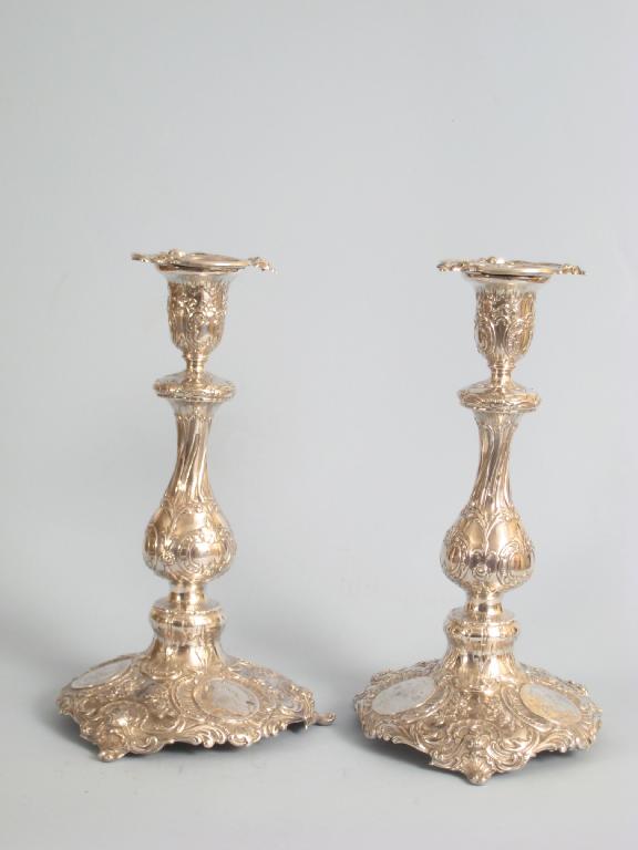 Appraisal: Pair of German Candlesticks on baluster columns scroll embossed circular