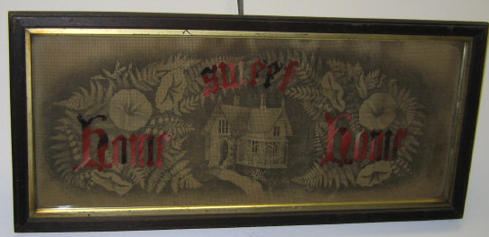 Appraisal: STENCILED AND EMBROIDERED PLAQUE A carbon perforated paper with black