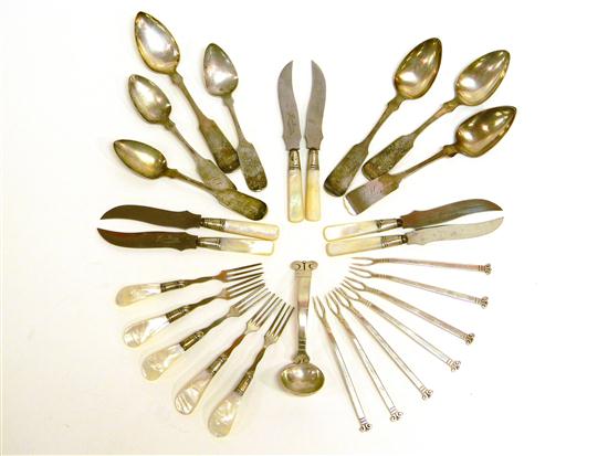 Appraisal: Silver including four coin teaspoons ladel mother-of-pearl handle knives and