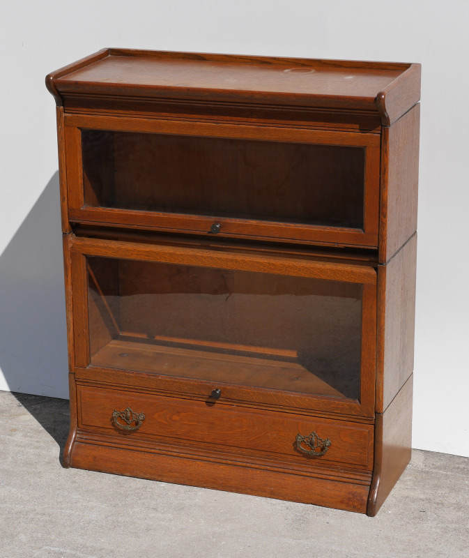 Appraisal: OAK STACKING BOOKCASE WITH DRAWER stacks over base with drawer