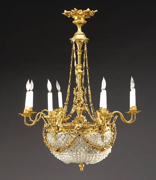 Appraisal: A Belle poque gilt bronze and glass eight light chandelier