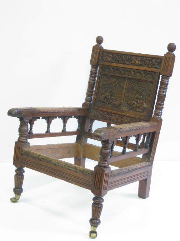 Appraisal: An Arts Crafts pitch pine and oak low Easy Chair