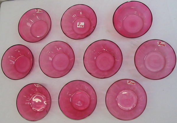 Appraisal: NINE CRANBERRY GLASS ICE CREAM BOWLS with thickened panels Diameters