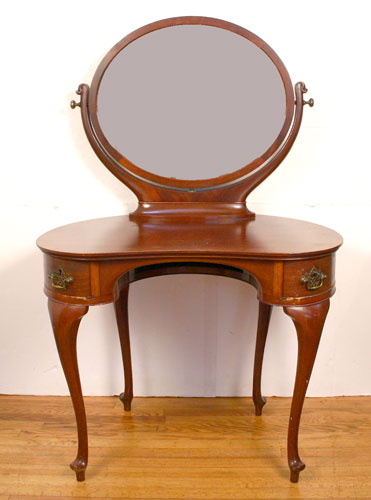 Appraisal: SOLID MAHOGANY DRESSING TABLE VANITY Oval mirror pivots and swings