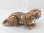 Appraisal: Royal Copenhagen A ceramic leopard crouching and baring its teeth