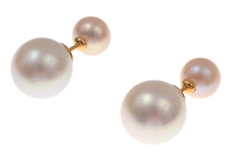 Appraisal: A PAIR OF SOUTH SEA AND CULTURED PEARL STUD EARRINGS