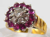 Appraisal: A yellow metal tests carat gold ruby and diamond ring