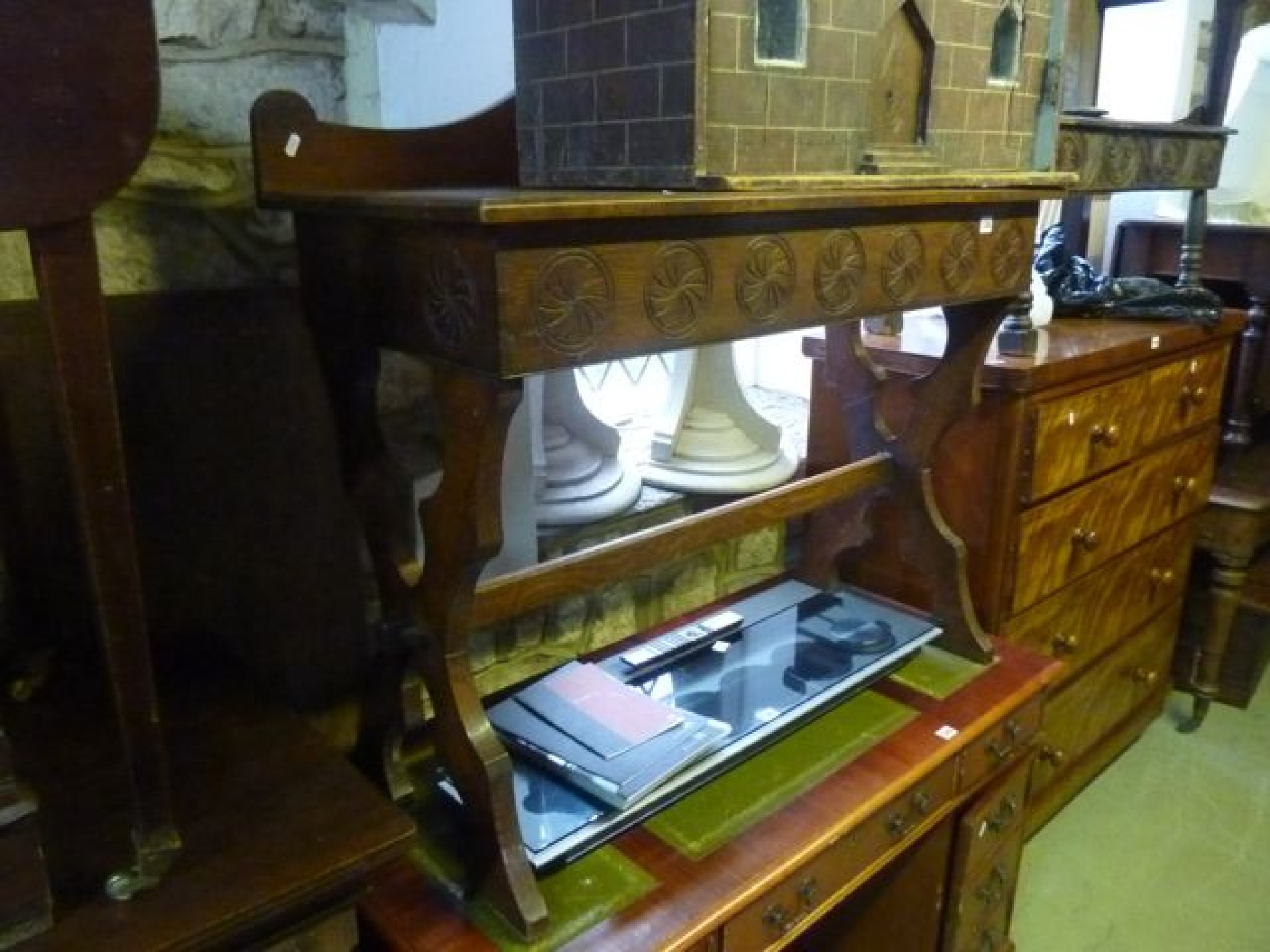 Appraisal: A Victorian oak hall side table with shallow raised and