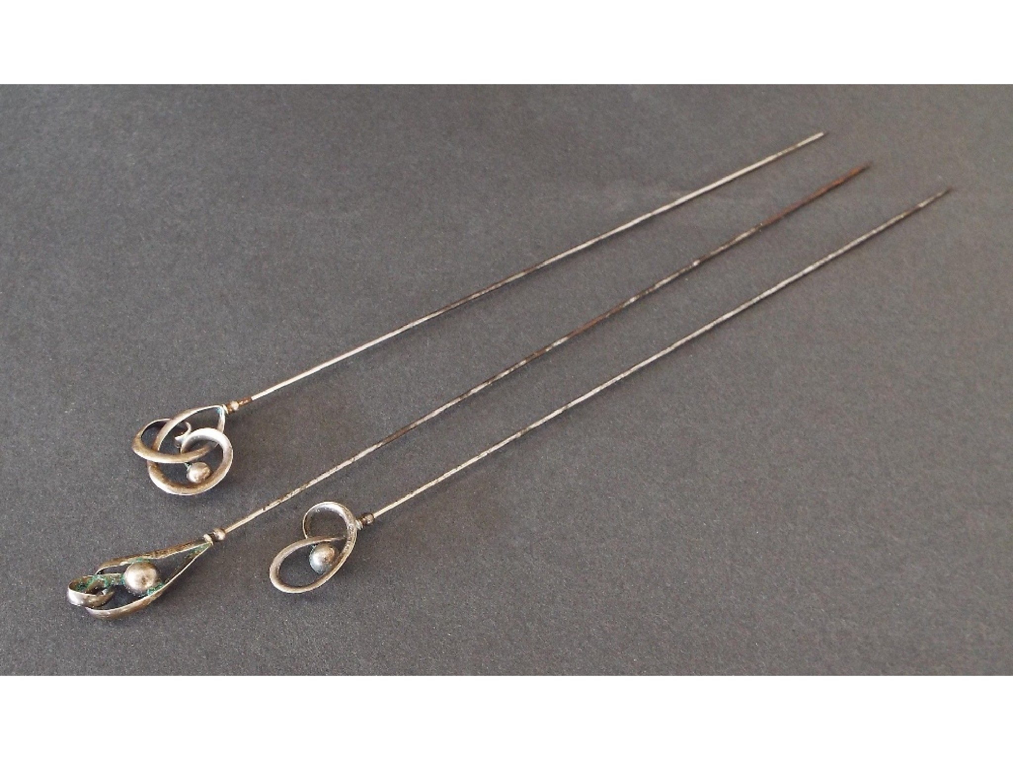 Appraisal: Three Charles Horner Art Nouveau silver hat pins each with