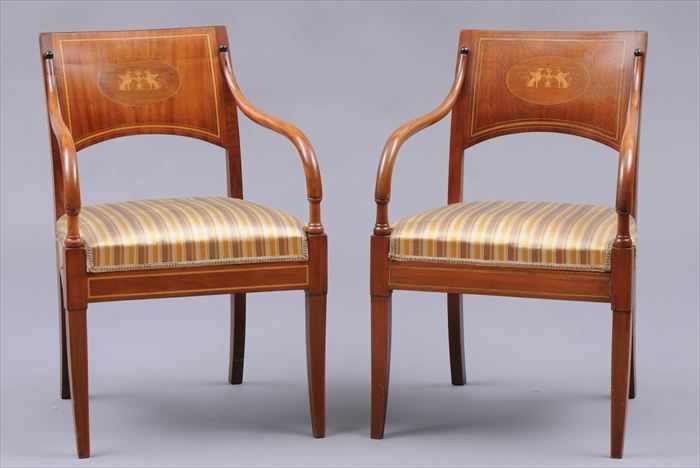 Appraisal: PAIR OF CONTINENTAL NEOCLASSICAL MAHOGANY ARMCHAIRS Each with solid backs